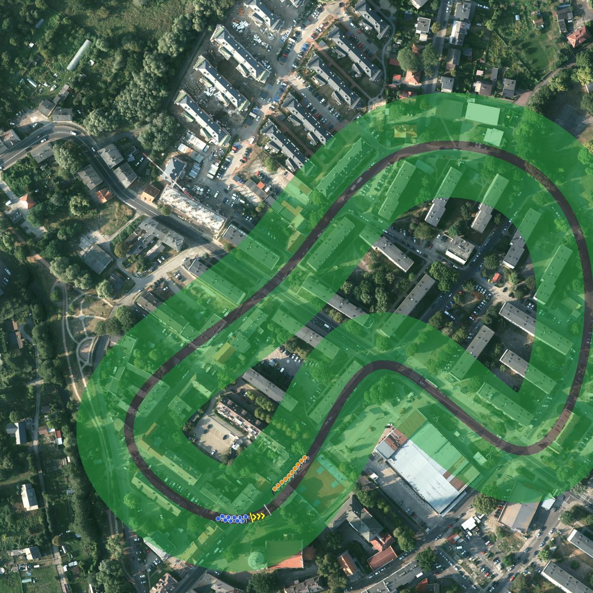 Top-down preview of dabie with the generated road, kerbs and grid overlaid on satellite imagery