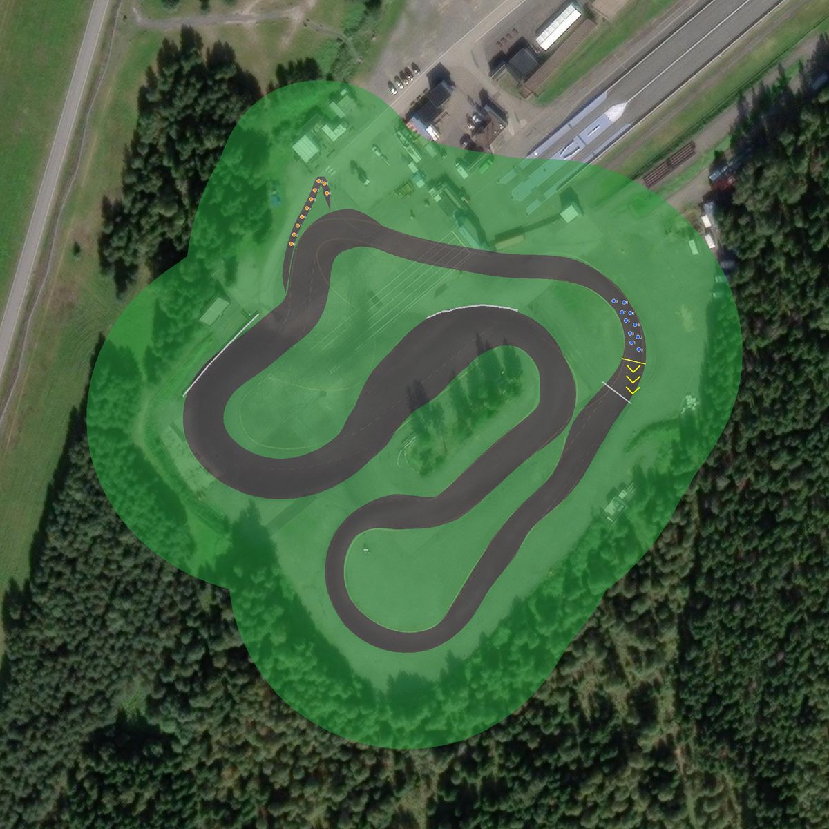 Top-down preview of Gardermoen raceway with the generated road, kerbs and grid overlaid on satellite imagery