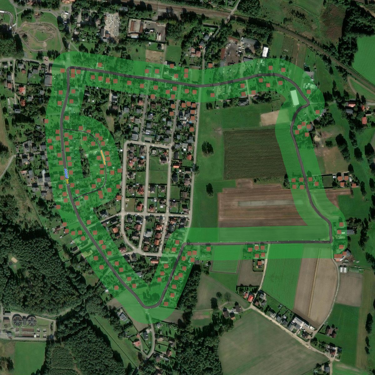 Top-down preview of GP Klachowiec with the generated road, kerbs and grid overlaid on satellite imagery