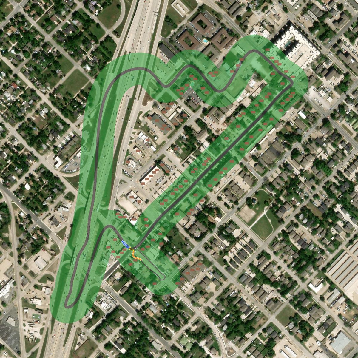 Top-down preview of jimmy_johns_speightavenue with the generated road, kerbs and grid overlaid on satellite imagery