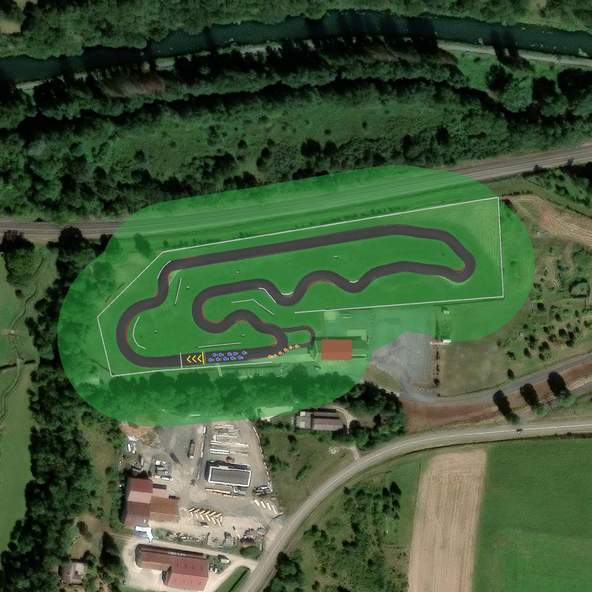 Top-down preview of kart52 with the generated road, kerbs and grid overlaid on satellite imagery