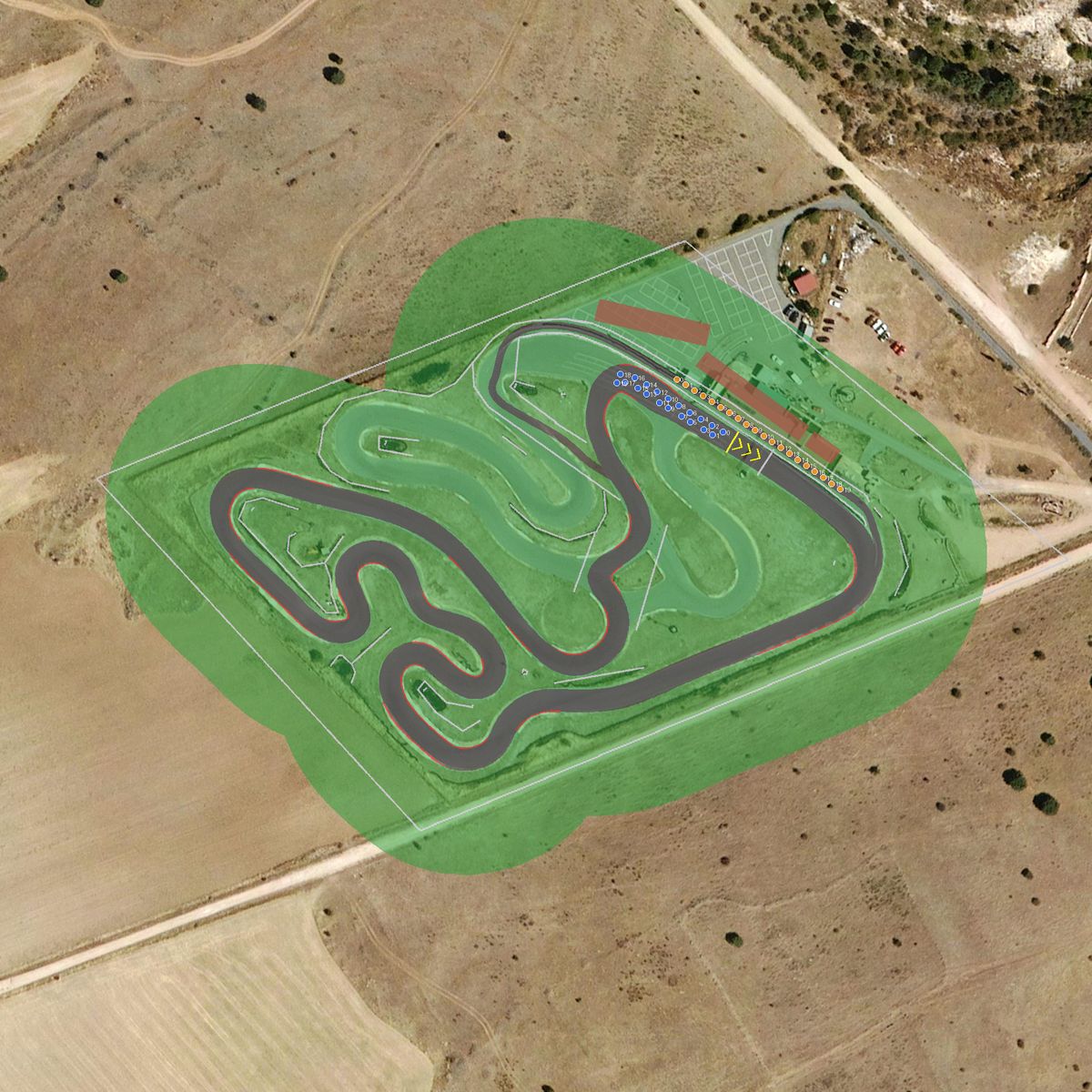 Top-down preview of Karting Diez Kartpetania with the generated road, kerbs and grid overlaid on satellite imagery