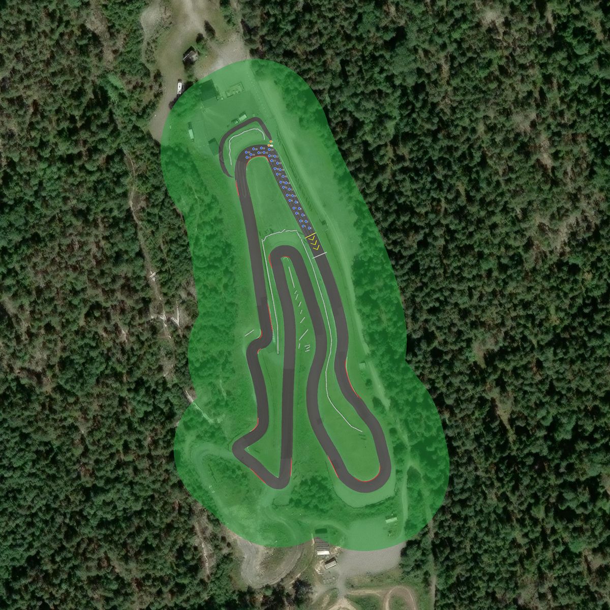 Top-down preview of SKRC Tuvängen Gokart with the generated road, kerbs and grid overlaid on satellite imagery