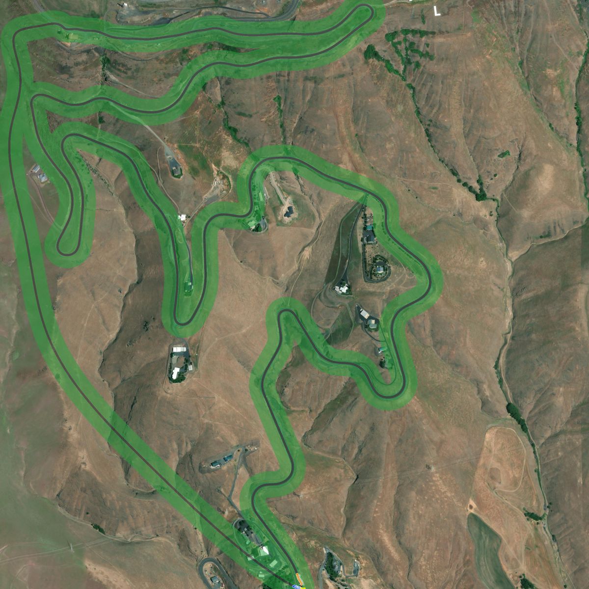 Top-down preview of Spiral with the generated road, kerbs and grid overlaid on satellite imagery